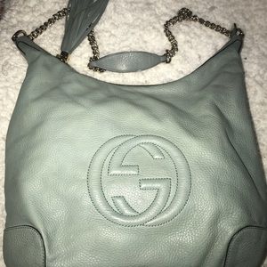Embossed Gucci hobo chain bag